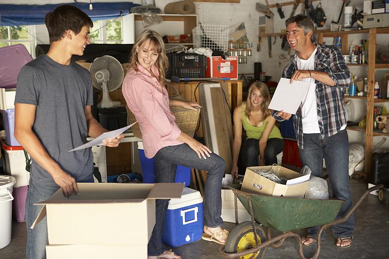 Tenant Family Sorting Items in Garage